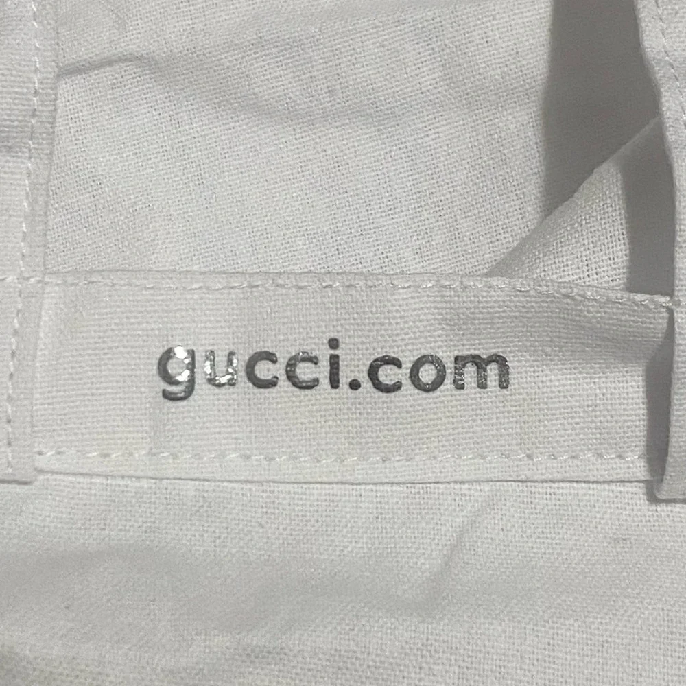 Gucci Silver Logo White Tote 13.5x 10.5 x 5.5 .